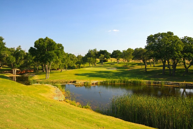 The par-4 17th hole at Vaaler Creek Golf Club features a small ...