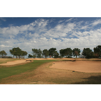 No. 6 on the Ram Rock golf course is a short par 4 that features a green heavily guarded with sand traps. 