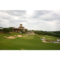 The 18th hole of the Westin La Cantera's Palmer Course features a dramatic shot downhill to the green protected by water.