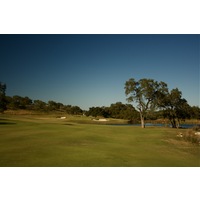 Cordillera Ranch G.C.'s par-4 sixth plays downhill from the tee to a green that is guarded by a pond front and right.