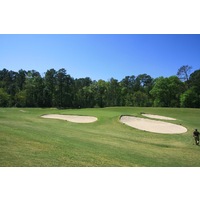 Bunkers surround the fourth hole at Tour 18 Houston, a rendition of the 18th hole at Inverness. 