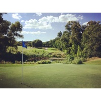 The eighth hole at Lost Creek is a par 3 that plays over a creek.