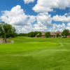 A view of a green and the clubhouse at Heritage Ranch Golf and Country Club.
