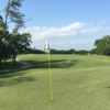 A sunny day view of a hole at Sienna Plantation Golf Club.