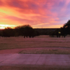 A sunset view of a green at Tenison Park Golf Club.