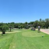 A view of a blue tee and a green at Scott Schreiner Golf Club.