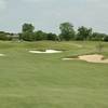 View of the 4th green with bunker traps at Sherrill Park Municipal Golf Course - Course One