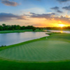 A sunset view of a green at Westwood Golf Club.