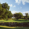 A view over the water of the 6th green at Golf Club of Fossil Creek