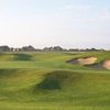 A view of the 5th green protected by bunkers at WestRidge Golf Course