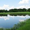 A view over the water of green at Bryan Golf Course