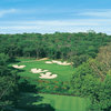 A view of green #17 surrounded by bunkers at Cowboys Golf Club