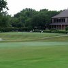 A view of the clubhouse and putting green at Diamond Oaks Country Club