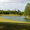 A view of a green surrounded by water at BraeBurn Country Club