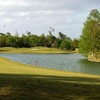 A view of green surrounded by water at Brae Burn Country Club