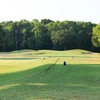 A view of green protected by bunkers at Pine Forest Country Club