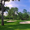 A view of green protected by bunkers at Houston Country Club