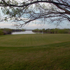 A view of the 18th green with water in background at Llano Grande Golf Course