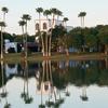 A view over the water of the clubhouse at Rancho Viejo Resort & Country Club