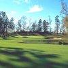 A view of a green at Whispering Pines Golf Club