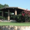 A view of the clubhouse and putting green (courtesy of Wichita Falls Country Club)