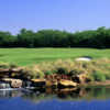 A view of green surrounded by water (Courtesy of Wichita Falls Country Club)