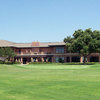 A view of the clubhouse and putting green at Midland Country Club