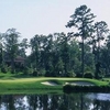 A view over the water of the 9th green at Nicklaus Course from Club At Carlton Woods