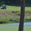 A view of a green with water coming into play at Hills of Lakeway Country Club