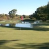 A view of green #3 with water in background at Battle Lake Golf Course