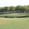 A view of a green surrounded by water at SugarTree Golf Club