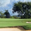 A view of a green protected by bunkers at Rockwall Golf and Athletic Club