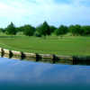 A view over the water of a green at Prairie Lakes Golf Course