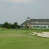 A view of green #18 and clubhouse in background at Tangle Ridge Golf Club