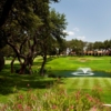 A sunny day view of tee #6 from Oak Hills Country Club