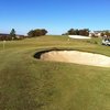 A view of the putting green and practice bunker at The Timber Links at Denton