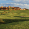 A view of the 1st green with clubhouse in background at Wildhorse Golf Club of Robson Ranch
