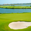 A view of the 14th green with bunker in foreground at Moody Gardens Golf Course