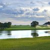 A view over the water of the 18th hole at The Bridges - Preston Crossings