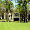 A view of the clubhouse with putting green in foreground at Northgate Country Club