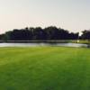 A view of a green with water coming into play at Benbrook 3 Par.