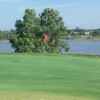 A view of a hole with water in background at P.A.R. Country Club.