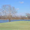 A view of green #11 surrounded by water at Denison Country Club.