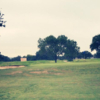 A view of a green at Devine Golf Course.