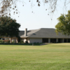 A view of the clubhouse and a tee at El Campo Country Club.