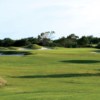 A view of a green surrounded by bunkers from The Cliffs Resort.