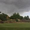 A sloudy day view of a green at Alpine Country Club.