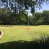 A sunny day view of a hole at Thorntree Country Club.