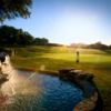 A sunny day view of a green at Avery Ranch Golf Club.