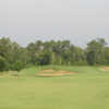 A view of a green protected by bunkers at Beaumont Country Club.